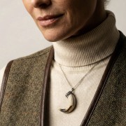 Hunting necklace featuring a boar tusk