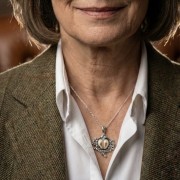 hunting necklace on a woman's neck