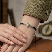 authentic hunting jewelry bracelet with deer teeth and black cord