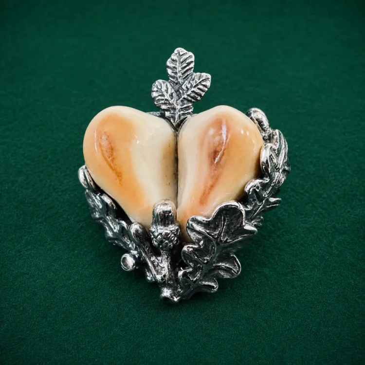 Handmade hunting pin with stag deer teeth and botanical sterling silver setting
